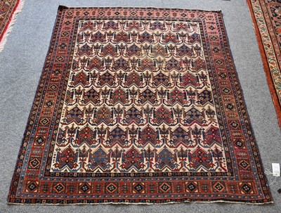 Lot 1145 - Afshar Rug, the ivory field with rows of...