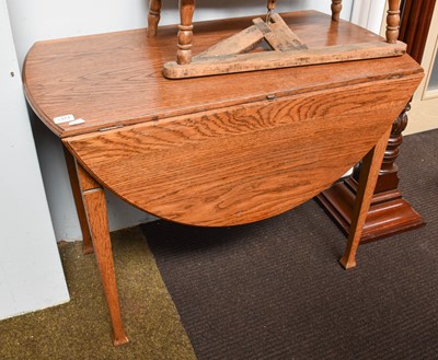 Lot 1373 - An Early 20th Century Oak Drop Leaf Table,...