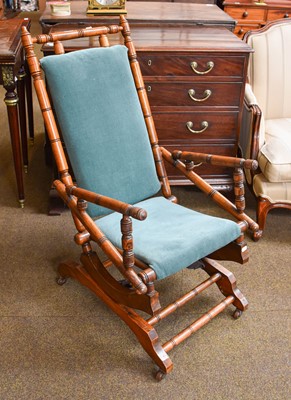 Lot 1342 - An American Rocking Chair