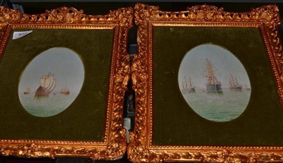 Lot 405 - A pair of small oval marine oils, framed