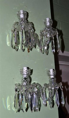 Lot 419 - Pair of Waterford glass twin branch wall lights with glass drops
