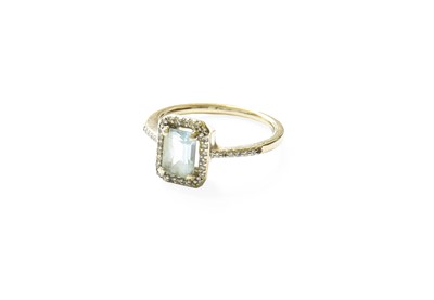 Lot 370 - A Blue Topaz and Diamond Cluster Ring, the...