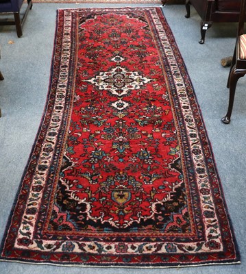 Lot 1175 - Hamadan Runner, the tomato field with floral...