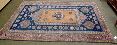 Lot 1133 - Turkish Rug, the indigo field of polychrome...