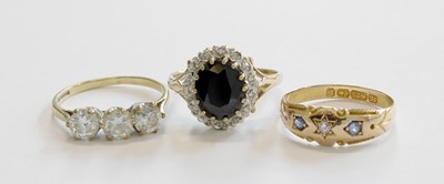 Lot 225 - A 15 Carat Gold Sapphire and Diamond Ring,...