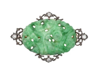 Lot 2349 - A Jade and Diamond Brooch, circa 1900 the oval...