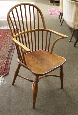 Lot 1340 - A 19th Century Ash and Elm Windsor Armchair,...