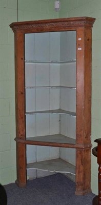 Lot 435 - A Georgian pine standing corner cabinet (lacking doors)