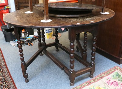 Lot 1266 - A 18th Century Oak Gate Leg Table, on turned...