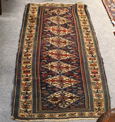 Lot 1169 - Kuba Runner, the indigo field with a column of...