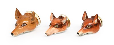 Lot 84 - An English Porcelain Fox Mask Stirrup Cup, mid...