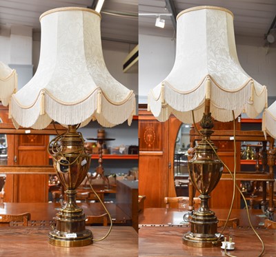 Lot 1314 - A Pair of Brass Table Lamps, in Classical...