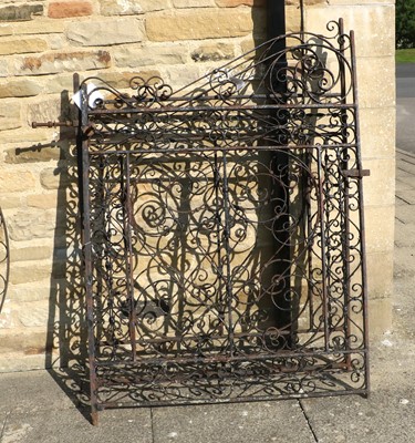 Lot 1202 - A Pair of Wrought Iron Gates decorated with...