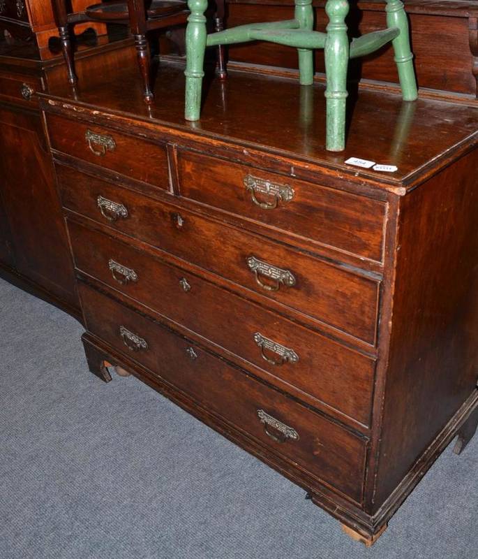 Lot 454 - A 19th century oak four height chest of drawers with later back rail