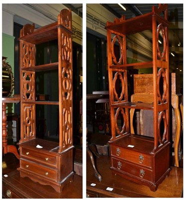 Lot 456 - Two similar reproduction open bookcases with drawers below