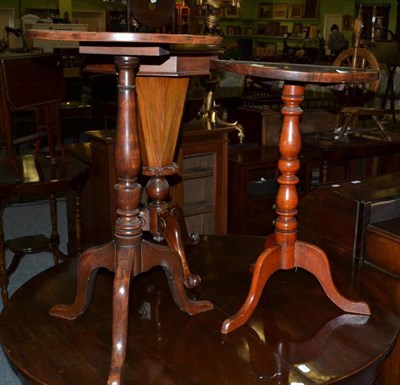 Lot 459 - A 19th century oak tripod occasional table with later top and a tripod games table