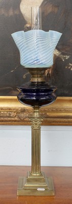 Lot 332 - A Victorian Oil Lamp, with brass column...