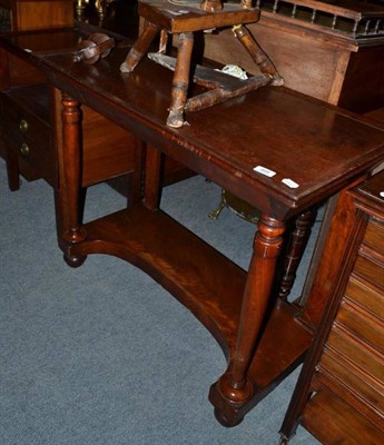Lot 468 - An early Victorian mahogany three drawer side table with undertier