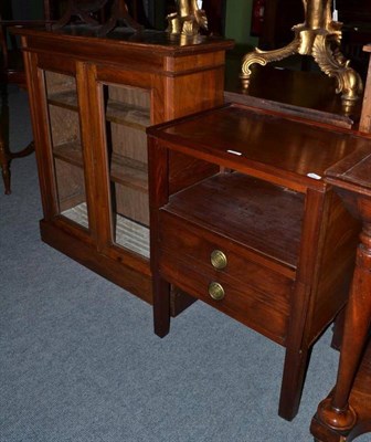 Lot 470 - A 19th century two door glazed bookcase and a reproduction side table