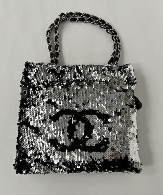 Lot 1089 - Circa 2008/9 Chanel Summer Night Bag, in black...