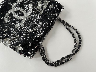 Lot 1089 - Circa 2008/9 Chanel Summer Night Bag, in black...