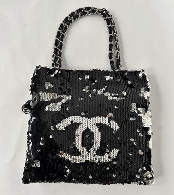 Lot 1089 - Circa 2008/9 Chanel Summer Night Bag, in black...