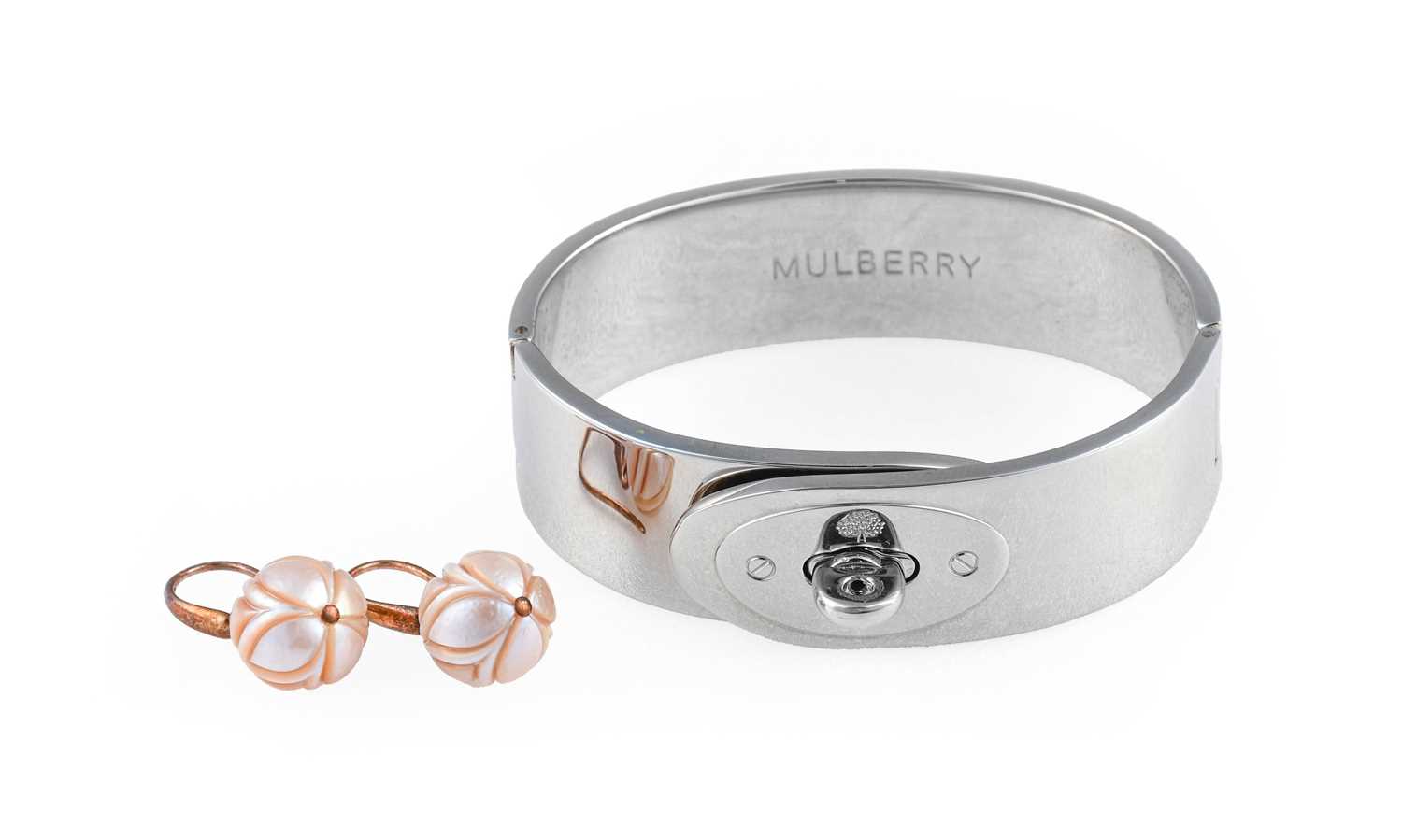 Lot 1065 - A Bangle, by Mulberry, the chrome bangle with...