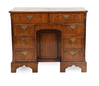 Lot 714 - A George II Walnut Bureau-Table, circa 1730-40,...