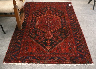 Lot 1154 - Hamadan Rug, the charcoal field of stylised...