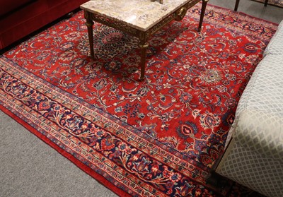 Lot 1167 - Sarouk Carpet, the tomato red field of...