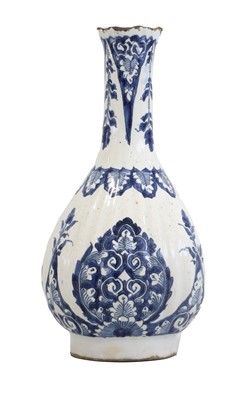 Lot 571 - A Delft Bottle Vase, circa 1700, of fluted...