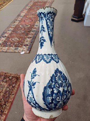 Lot 571 - A Delft Bottle Vase, circa 1700, of fluted...