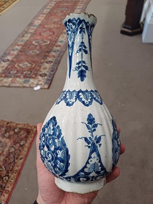 Lot 571 - A Delft Bottle Vase, circa 1700, of fluted...