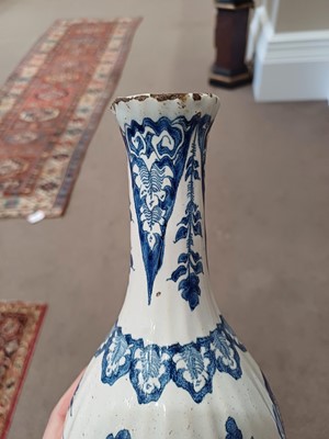 Lot 571 - A Delft Bottle Vase, circa 1700, of fluted...