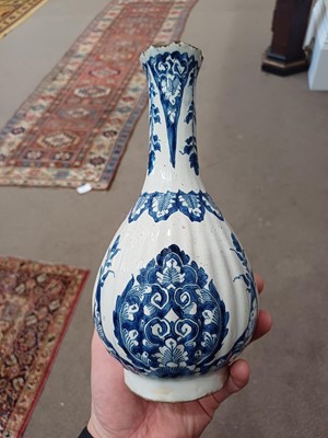 Lot 571 - A Delft Bottle Vase, circa 1700, of fluted...