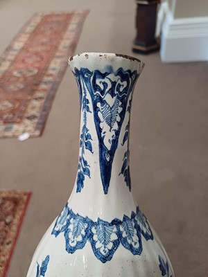 Lot 571 - A Delft Bottle Vase, circa 1700, of fluted...