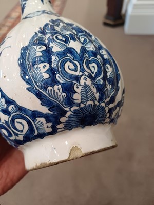Lot 571 - A Delft Bottle Vase, circa 1700, of fluted...