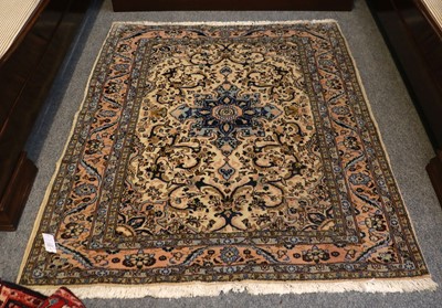 Lot 1160 - Moud Rug, the ivory field with ice blue...