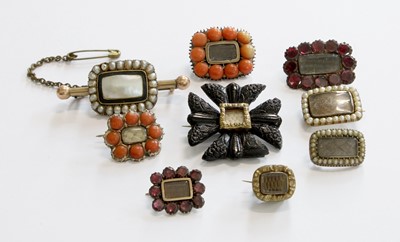 Lot 170 - Eight Mourning Brooches, each with locket...