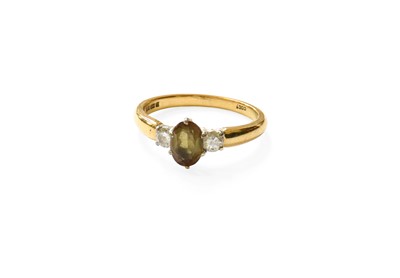 Lot 497 - A 9 Carat Gold Andalusite and Diamond Three...