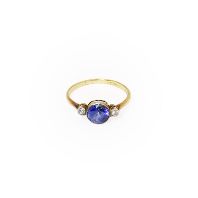 Lot 278 - A Synthetic Sapphire and Diamond Three Stone...