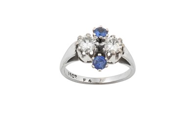 Lot 43 - A Blue Stone and Diamond Ring, a cluster...