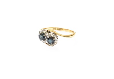 Lot 408 - An 18 Carat Gold Sapphire and Diamond Double...