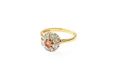 Lot 382 - An 18 Carat Gold Orange Sapphire and Diamond...