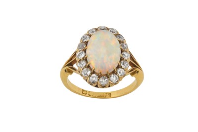 Lot 2361 - An 18 Carat Gold Opal and Diamond Cluster Ring...