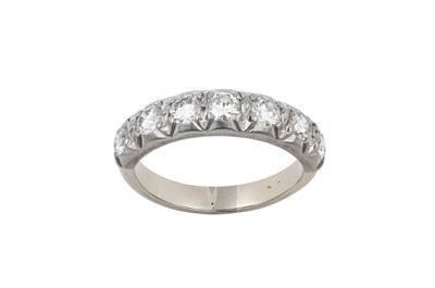 Lot 2383 - A Diamond Half Hoop Ring seven round brilliant...