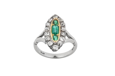 Lot 2341 - An Emerald and Diamond Cluster Ring an emerald-...