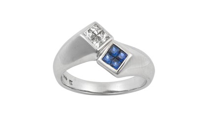 Lot 2312 - A Sapphire and Diamond Crossover Ring the...