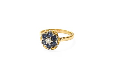 Lot 399 - A Sapphire and Diamond Cluster Ring, of flower...