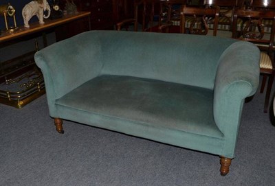 Lot 511 - A mahogany framed blue upholstered two seater sofa